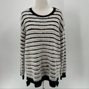Woman’s Black and White Stripped Sweater